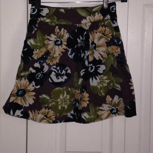 Brown flowered skirt.